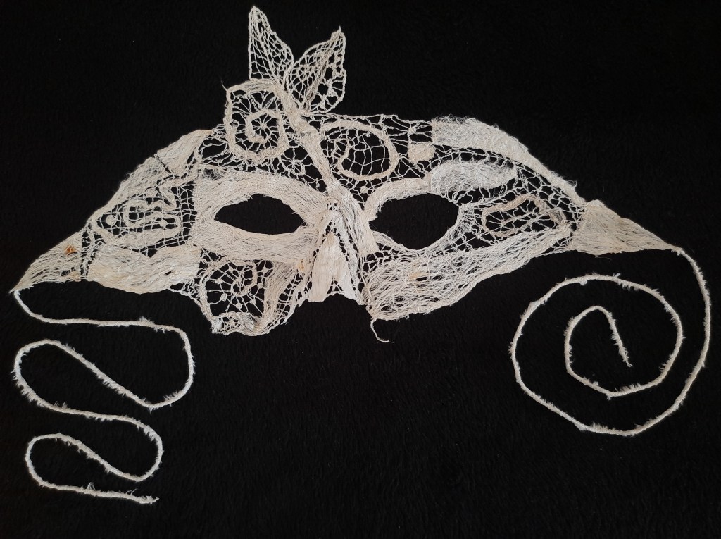 White tapa and lacce mask